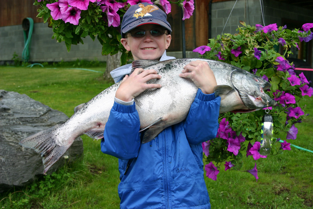 Happy Kids Catching King Salmon Alaska